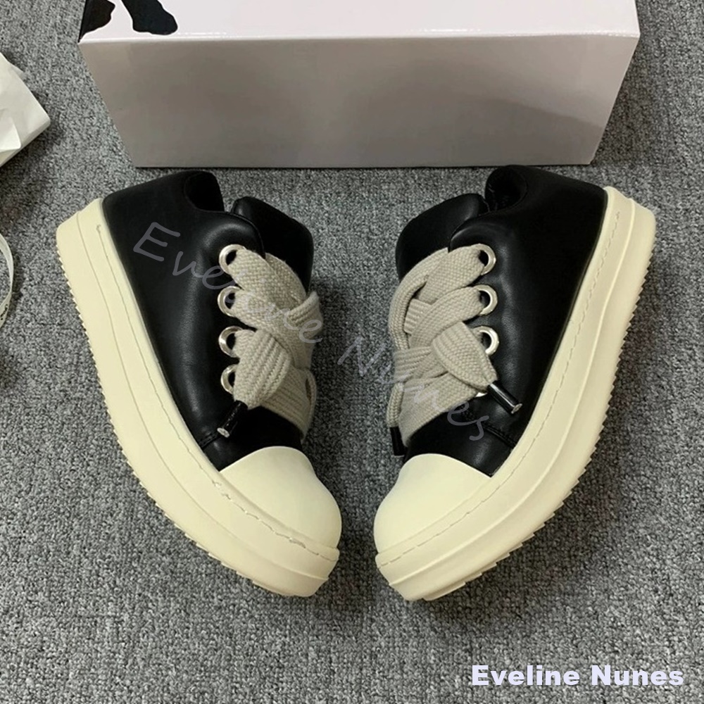 Canvas Sneaker High - أحذية رياضية جلدية سوداء للجنسين ذات